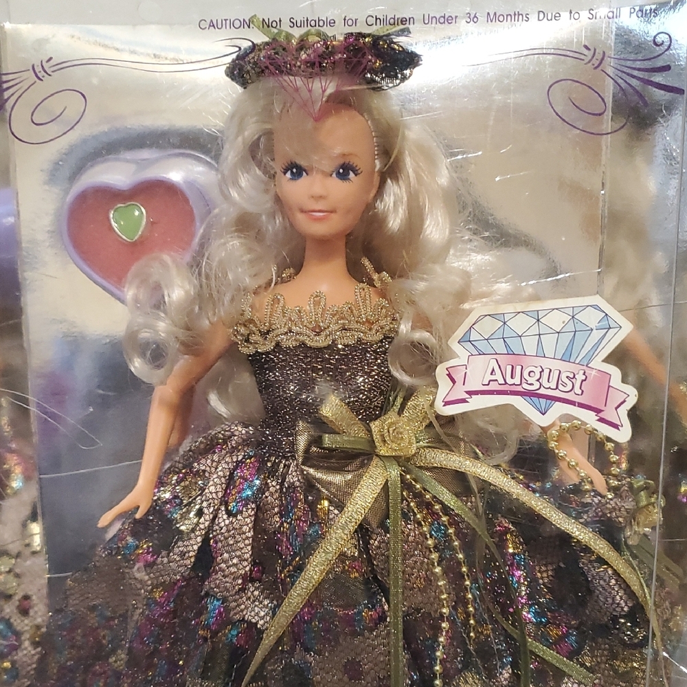 Barbie Gold and Purple Doll with Elegant Accessories